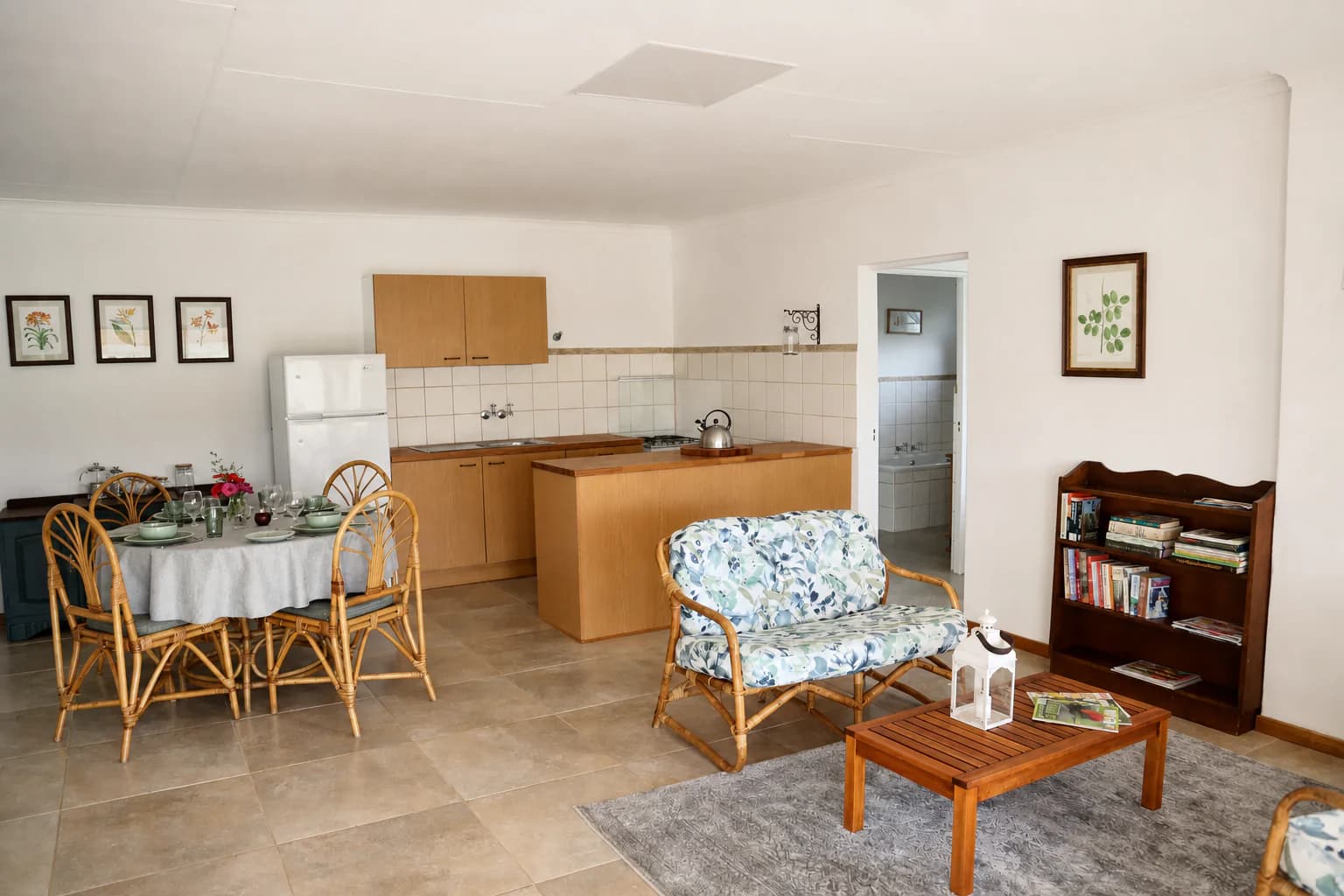 Open-plan living and dining area in Wild Olive Cottage