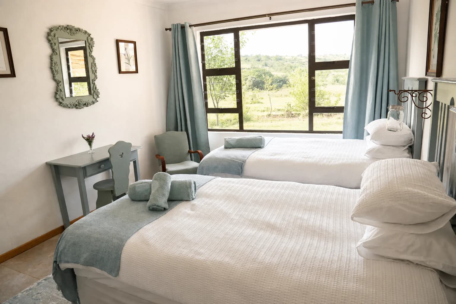 Twin bedroom in Wild Olive Cottage